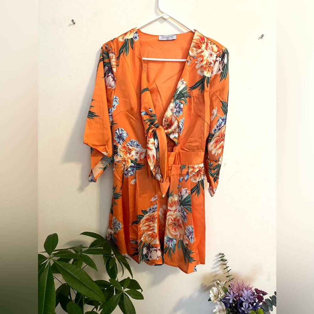 NWOT Closette chic Floral soft Fabric Romper in Size M